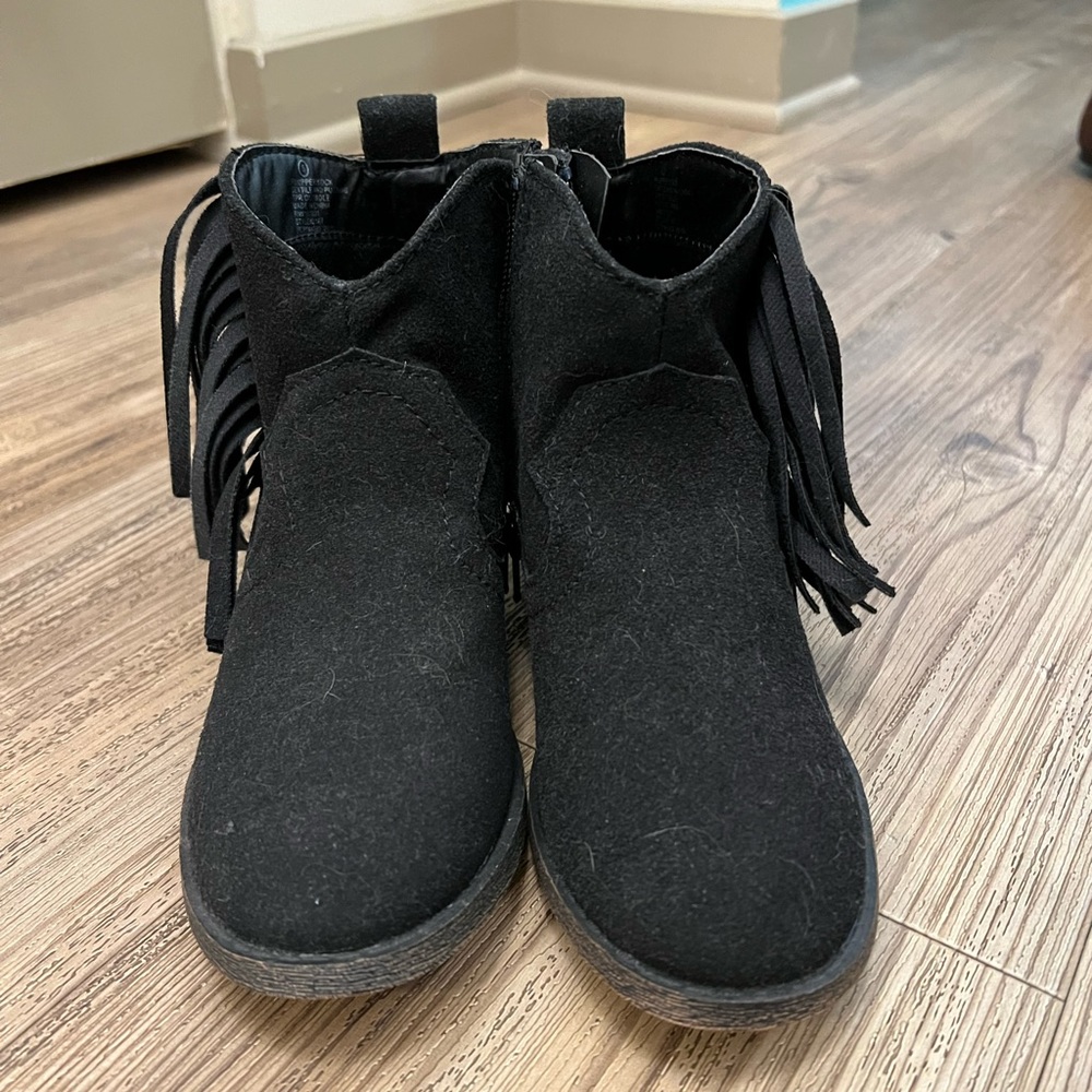 Black suede boots with fringe